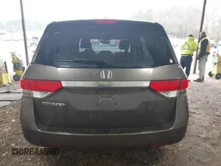 2014 Honda Odyssey EX-L with VIN 5FNRL5H6XEB060090, listed as a IAAI auction lot 41625571 with 112,762 mi miles and . Bid and sale history available at carsss.com. Image 16.