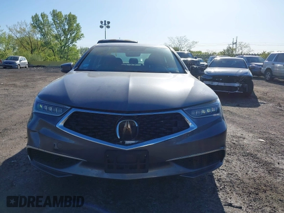2018 Acura TLX with VIN 19UUB1F31JA011086, listed as a IAAI auction lot 42125299 with 115,171 mi miles and . Bid and sale history available at DreamBid. Image 12.