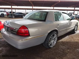 2006 Mercury Grand Marquis GS with VIN 2MEFM74VX6X638763, listed as a IAAI auction lot 41735612 with 123,914 mi miles. Bid and sale history available at carsss.com. Image 4.