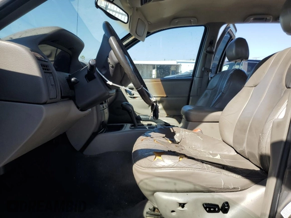2000 Jeep Grand Cherokee Laredo with VIN 1J4G248S2YC377133, listed as a Copart auction lot 57916785 with 217,525 mi miles and Salvage title. Bid and sale history available at DreamBid. Image 7.