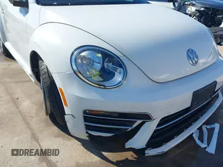 2019 Volkswagen Beetle S with VIN 3VW5DAAT0KM507437, listed as a IAAI auction lot 41380821 with 28,010 mi miles and . Bid and sale history available at DreamBid. Image 6.