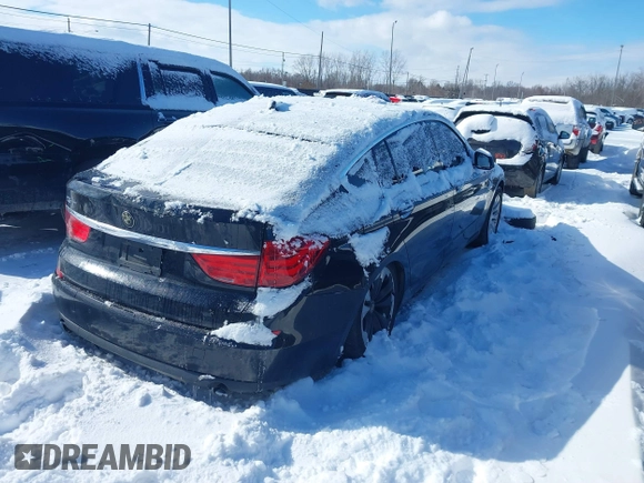 2011 BMW 5 Series GT 535i xDrive with VIN WBASP2C50BC337130, listed as a IAAI auction lot 41600050 with 134,187 mi miles. Bid and sale history available at carsss.com. Image 4.