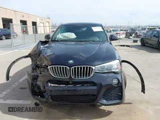 2015 BMW X4 xDrive35i with VIN 5UXXW5C50F0E87728, listed as a IAAI auction lot 41819628 with 136,042 mi miles and . Bid and sale history available at DreamBid. Image 13.