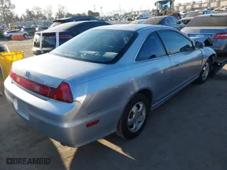 2001 Honda Accord Cpe EX with VIN 1HGCG32571A018284, listed as a IAAI auction lot 42019254 with 157,012 mi miles. Bid and sale history available at carsss.com. Image 4.