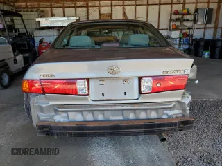 2001 Toyota Camry CE z VIN JT2BG22K610585062, wystawiony jako Copart lot #50842765 z przebiegiem 73 035 mil mil oraz Szkoda całkowita • Salvage title. Historia ofert i sprzedaży dostępna na DreamBid. Obrazek 6.