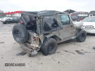 2003 Jeep Wrangler X with VIN 1J4FA39SX3P329386, listed as a IAAI auction lot 41407594 with 140,390 mi miles. Bid and sale history available at carsss.com. Image 4.