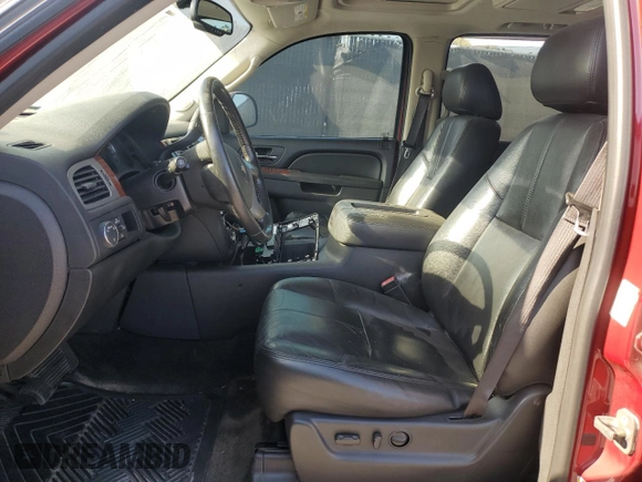 2013 Chevrolet Suburban LT with VIN 1GNSCJE08DR374024, listed as a Copart auction lot 54873375 with 141,206 mi miles and Salvage title. Bid and sale history available at DreamBid. Image 7.