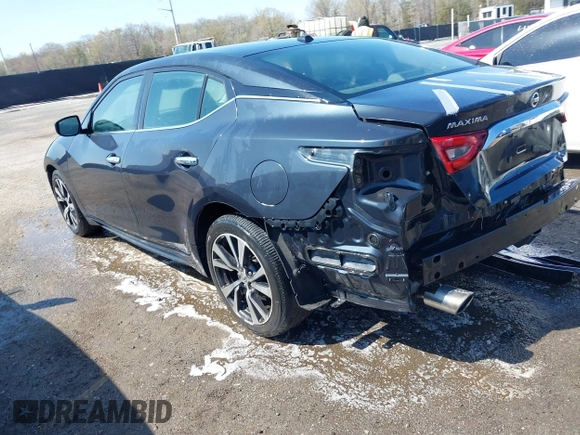 2016 Nissan Maxima SR with VIN 1N4AA6AP4GC419032, listed as a IAAI auction lot 41887138 with 164,208 mi miles and . Bid and sale history available at DreamBid. Image 3.