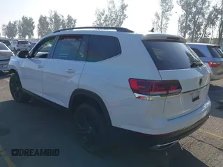 2023 Volkswagen Atlas SE z VIN 1V2WP2CA6PC533984, wystawiony jako IAAI lot #41021512 z przebiegiem 26 993 mil mil oraz . Historia ofert i sprzedaży dostępna na DreamBid. Obrazek 3.