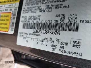 2016 Ford Fusion SE Hybrid with VIN 3FA6P0LU5GR235241, listed as a IAAI auction lot 41697504 with 165,510 mi miles. Bid and sale history available at carsss.com. Image 9.