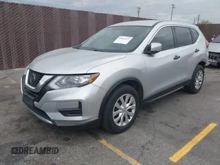 2018 Nissan Rogue S with VIN KNMAT2MT2JP605822, listed as a IAAI auction lot 42061477 with 114,808 mi miles. Bid and sale history available at carsss.com. Image 2.