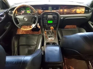 2004 Jaguar XJ with VIN SAJEA71C84SG07220, listed as a Copart auction lot 70916164 with 151,102 mi miles and Salvage Title. Bid and sale history available at carsss.com. Image 8.