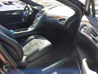 2019 Lincoln MKZ Reserve II z VIN 3LN6L5E99KR623668, wystawiony jako IAAI lot #41822730 z przebiegiem 13 609 mil mil oraz . Historia ofert i sprzedaży dostępna na DreamBid. Obrazek 5.