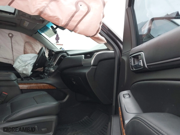 2015 Chevrolet Tahoe LTZ with VIN 1GNSCCKC7FR614886, listed as a IAAI auction lot 41679585 with 104,695 mi miles. Bid and sale history available at carsss.com. Image 5.