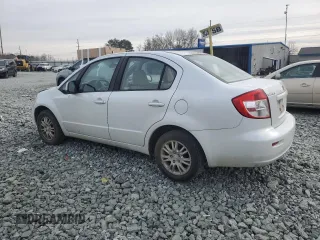 2013 Suzuki SX4 LE with VIN JS2YC5A37D6101979, listed as a Copart auction lot 42185855 with 118,855 mi miles and Salvage Title. Bid and sale history available at carsss.com. Image 2.