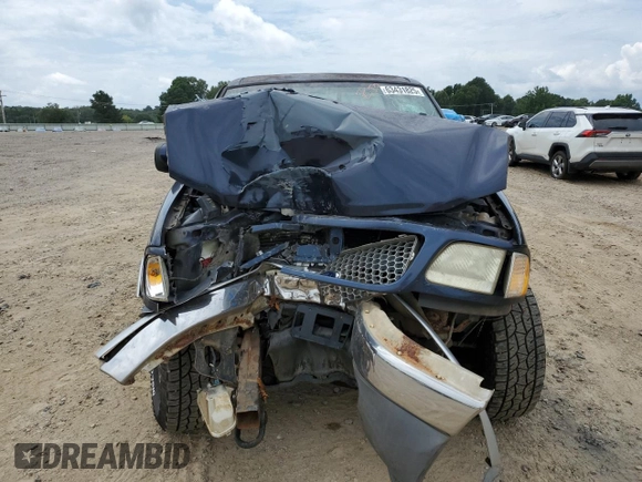2003 Ford F-150 XL with VIN 1FTRX18L43NA89733, listed as a Copart auction lot 63431825 with Not provided miles and Salvage title. Bid and sale history available at DreamBid. Image 5.