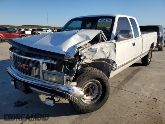 1991 GMC Sierra 1500 with VIN 2GTGC29K3M1532424, listed as a Copart auction lot 86216144 with 173,257 mi miles and Salvage Title. Bid and sale history available at DreamBid. Image 1.