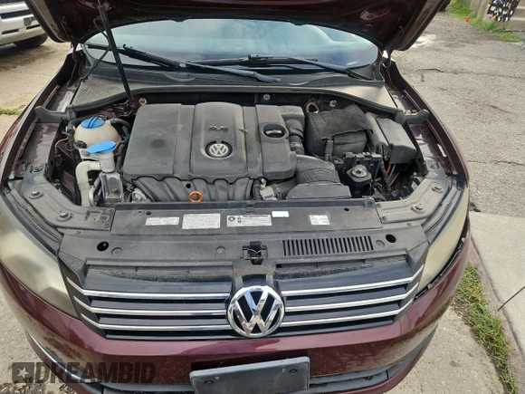 2013 Volkswagen Passat S with VIN 1VWAP7A30DC126376, listed as a Copart auction lot 65476255 with 144,933 mi miles and Clean title. Bid and sale history available at DreamBid. Image 7.
