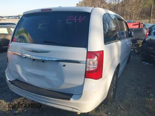 2015 Chrysler Town & Country S with VIN 2C4RC1HG7FR742447, listed as a IAAI auction lot 41814403 with 171,766 mi miles. Bid and sale history available at carsss.com. Image 4.