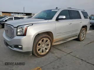 2015 GMC Yukon Denali with VIN 1GKS1CKJ4FR226192, listed as a Copart auction lot 51255745 with 112,342 mi miles and Salvage Title. Bid and sale history available at carsss.com. Image 1.