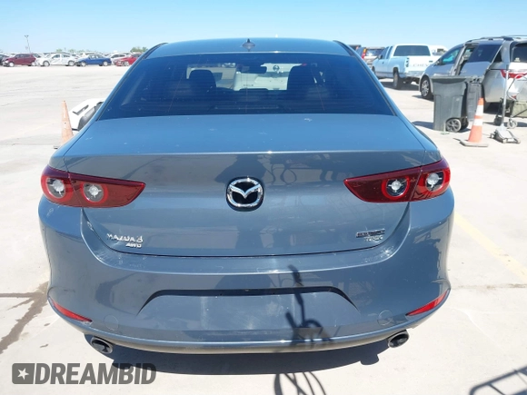 2022 Mazda 3 2.5 Turbo z VIN 3MZBPBAY8NM308426, wystawiony jako IAAI lot #41808563 z przebiegiem 44 693 mil mil oraz . Historia ofert i sprzedaży dostępna na DreamBid. Obrazek 17.