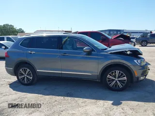 2018 Volkswagen Tiguan SEL z VIN 3VV3B7AXXJM205725, wystawiony jako IAAI lot #42285557 z przebiegiem 83 644 mil mil oraz . Historia ofert i sprzedaży dostępna na DreamBid. Obrazek 13.