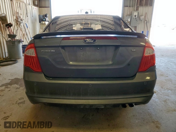 2012 Ford Fusion SE z VIN 3FAHP0HA1CR320160, wystawiony jako Copart lot #57597615 z przebiegiem 142 938 mil mil oraz Szkoda całkowita • Salvage title. Historia ofert i sprzedaży dostępna na DreamBid. Obrazek 6.