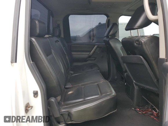 2011 Nissan Titan Pro-4X z VIN 1N6AA0EC6BN307938, wystawiony jako Copart lot #43291565 z przebiegiem 102 639 mil mil oraz Tytuł czysty. Historia ofert i sprzedaży dostępna na DreamBid. Obrazek 10.