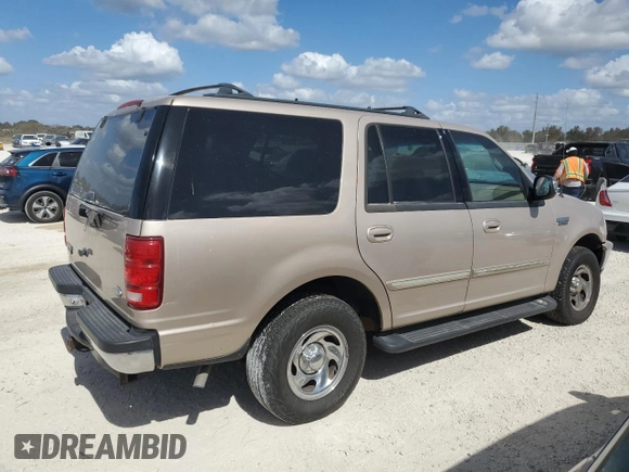 1997 Ford Expedition XLT with VIN 1FMEU17L7VLB84516, listed as a Copart auction lot 76664984 with 269,040 mi miles and Salvage title. Bid and sale history available at DreamBid. Image 3.