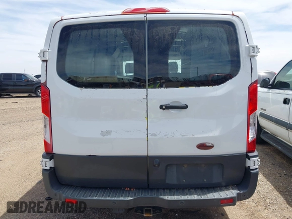 2018 Ford Transit Cargo with VIN 1FTYE1YG4JKA25467, listed as a IAAI auction lot 41738700 with 198,126 mi miles and . Bid and sale history available at DreamBid. Image 16.