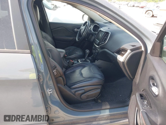 2014 Jeep Cherokee Trailhawk z VIN 1C4PJMBS2EW161276, wystawiony jako IAAI lot #42283358 z przebiegiem 135 201 mil mil oraz . Historia ofert i sprzedaży dostępna na DreamBid. Obrazek 5.