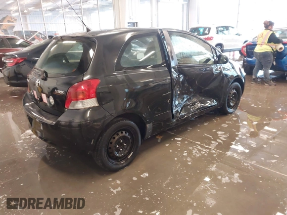 2011 Toyota Yaris with VIN JTDJT4K3XB5327229, listed as a IAAI auction lot 41275717 with 140,276 mi miles. Bid and sale history available at carsss.com. Image 4.