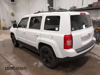 2014 Jeep Patriot Latitude with VIN 1C4NJPFB8ED717749, listed as a IAAI auction lot 41962155 with 147,755 mi miles and . Bid and sale history available at carsss.com. Image 3.