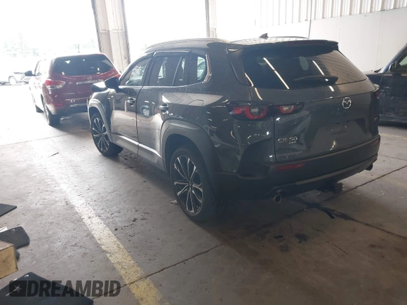 2024 Mazda CX-50 S Premium Plus z VIN 7MMVABEM7RN194987, wystawiony jako IAAI lot #42267229 z przebiegiem 10 039 mil mil oraz . Historia ofert i sprzedaży dostępna na DreamBid. Obrazek 3.