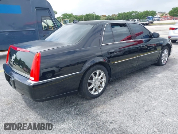 2010 Cadillac DTS w/1SC with VIN 1G6KD5EY8AU106072, listed as a IAAI auction lot 41999952 with 165,866 mi miles. Bid and sale history available at carsss.com. Image 4.