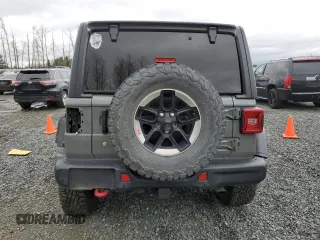 2018 Jeep Wrangler Unlimited Rubicon with VIN 1C4HJXFNXJW196460, listed as a Copart auction lot 49681715 with 71,187 mi miles and Salvage title. Bid and sale history available at DreamBid. Image 6.