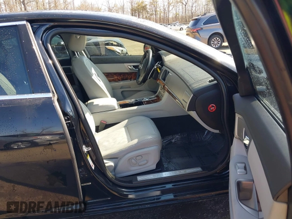 2011 Jaguar XF with VIN SAJWA0FB7BLS01476, listed as a IAAI auction lot 41662462 with 128,048 mi miles. Bid and sale history available at carsss.com. Image 5.