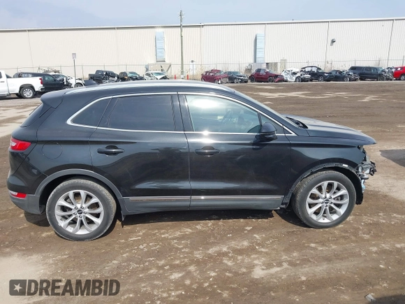 2015 Lincoln MKC with VIN 5LMTJ2AH0FUJ04461, listed as a IAAI auction lot 41804169 with 97,187 mi miles. Bid and sale history available at carsss.com. Image 13.