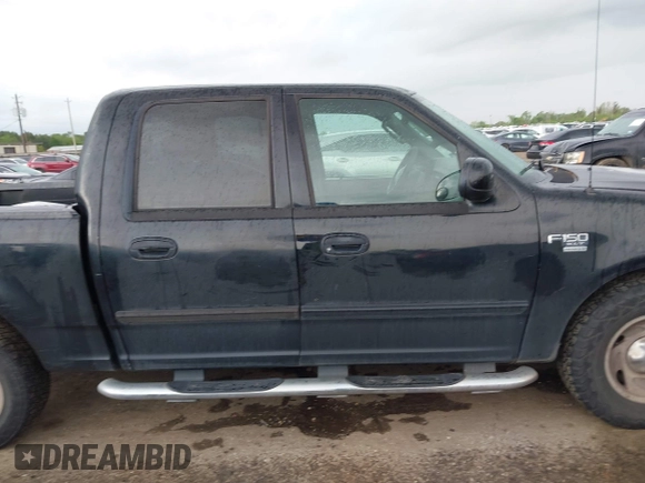 2003 Ford F-150 XLT with VIN 1FTRW07623KD67409, listed as a IAAI auction lot 41912067 with Not Provided miles. Bid and sale history available at carsss.com. Image 13.
