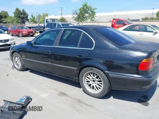 1997 BMW 5 Series 540iA with VIN WBADE6325VBW55346, listed as a IAAI auction lot 42085046 with 216,212 mi miles. Bid and sale history available at carsss.com. Image 3.