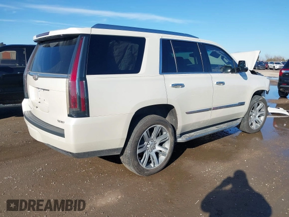 2015 Cadillac Escalade Luxury z VIN 1GYS3MKJXFR651714, wystawiony jako IAAI lot #41205449 z przebiegiem 129 066 mil mil oraz . Historia ofert i sprzedaży dostępna na DreamBid. Obrazek 4.