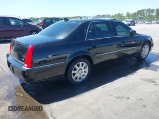 2011 Cadillac DTS Premium Collection z VIN 1G6KH5E65BU140314, wystawiony jako IAAI lot #42050040 z przebiegiem 149 921 mil mil oraz . Historia ofert i sprzedaży dostępna na DreamBid. Obrazek 4.