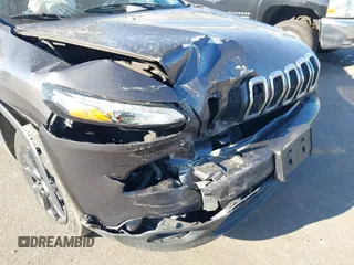 2016 Jeep Cherokee Latitude with VIN 1C4PJMCB8GW162224, listed as a IAAI auction lot 41847908 with 141,642 mi miles and . Bid and sale history available at carsss.com. Image 6.