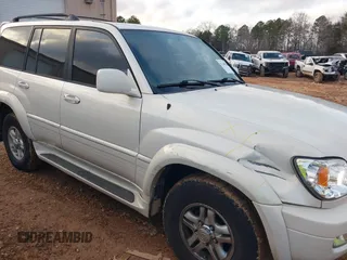 2000 Lexus LX 470 z VIN JT6HT00W9Y0103225, wystawiony jako IAAI lot #41148826 z przebiegiem 270 351 mil mil oraz . Historia ofert i sprzedaży dostępna na DreamBid. Obrazek 6.