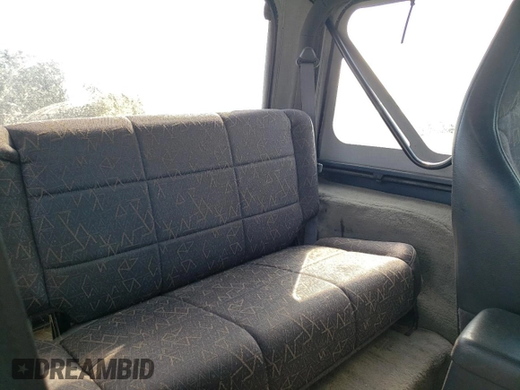 2002 Jeep Wrangler Sport с VIN 1J4FA49S02P734712, выставлен на аукционе Copart как лот 63310225 с пробегом 178 367 миль миль и Чистый • Clean title. История ставок и продаж доступна на DreamBid. Изображение 11.