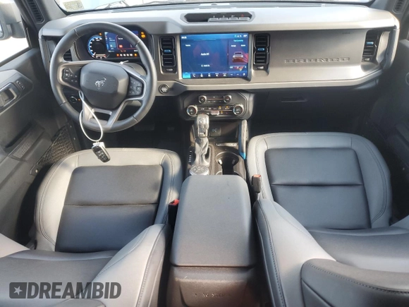 2024 Ford Bronco with VIN 1FMEE1BP7RLA20924, listed as a Copart auction lot 69381544 with 8,042 mi miles and Salvage title. Bid and sale history available at DreamBid. Image 8.