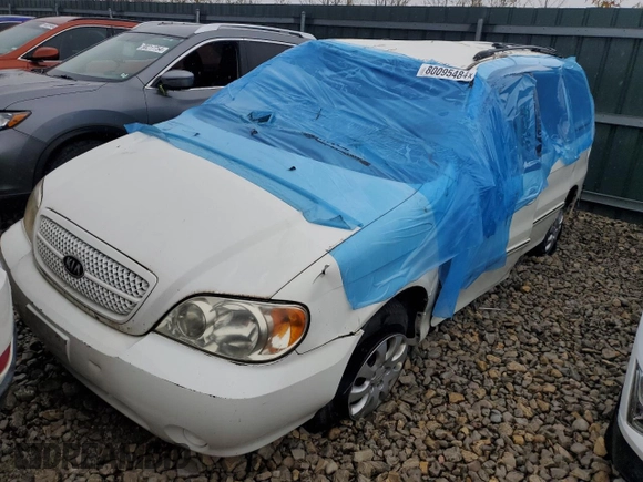 2005 Kia Sedona LX with VIN KNDUP132656684850, listed as a Copart auction lot 80095484 with 182,199 mi miles and Non Repairable. Bid and sale history available at carsss.com. Image 1.