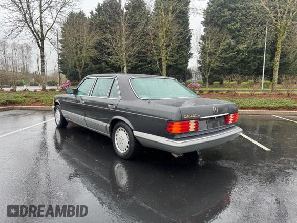 1988 Mercedes-Benz 560 with VIN WDBCA39D1JA406073, listed as a Copart auction lot 50398345 with 111,524 mi miles and Clean Title. Bid and sale history available at DreamBid. Image 3.