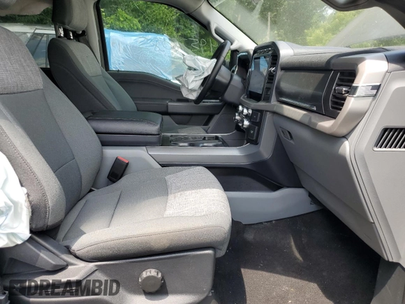 2023 Ford F-150 Lightning Pro z VIN 1FTVW1EL3PWG61686, wystawiony jako Copart lot #61353535 z przebiegiem 8 116 mil mil oraz Szkoda całkowita • Salvage title. Historia ofert i sprzedaży dostępna na DreamBid. Obrazek 7.