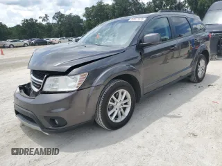 2017 Dodge Journey SXT z VIN 3C4PDCBG9HT515799, wystawiony jako Copart lot #62827975 z przebiegiem 156 215 mil mil oraz Szkoda całkowita • Salvage title. Historia ofert i sprzedaży dostępna na DreamBid. Obrazek 1.